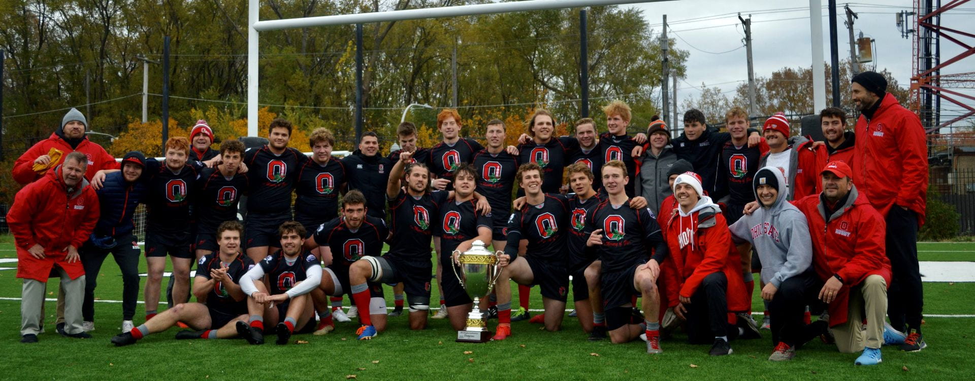 Ohio State Rugby team celebrating championship